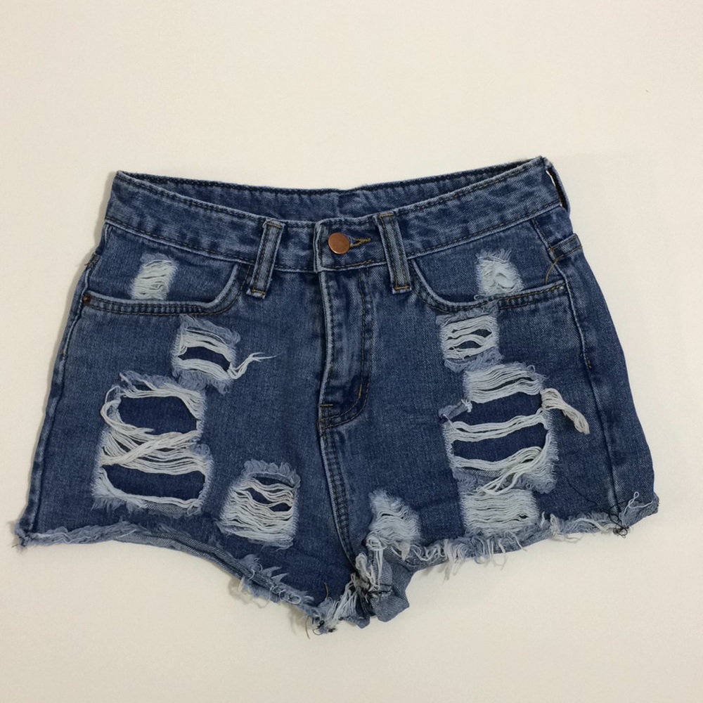 High waisted distressed blue jean shorts